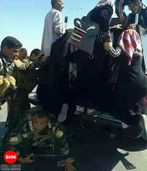 تصویر/کمر سرباز عراقی پله ی زوار حسینی