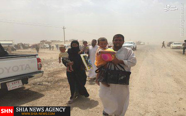 فرار دسته جمعی صدها عراقی از مناطق داعش +تصاویر