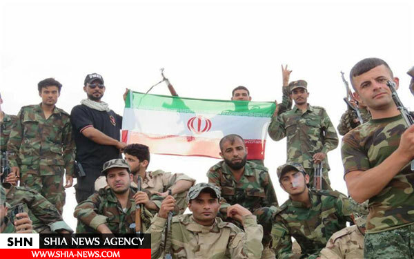 اهتزار پرچم ایران توسط عراقی‌ها + تصویر