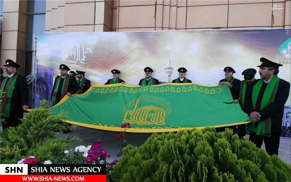تصویر  اهتزاز پرچم امام رضا(ع) در کمیته ملی المپیک