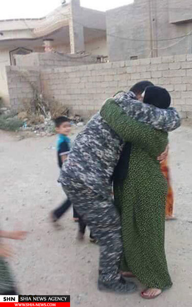 پلیس عراقی مادرش را از دست داعش نجات داد+ تصاویر