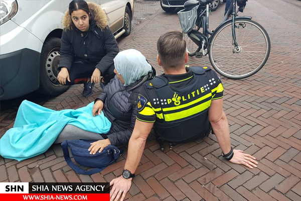 اقدام تحسین برانگیز یک نیروی پلیس هلند برای کمک به زن مسلمان + تصویر