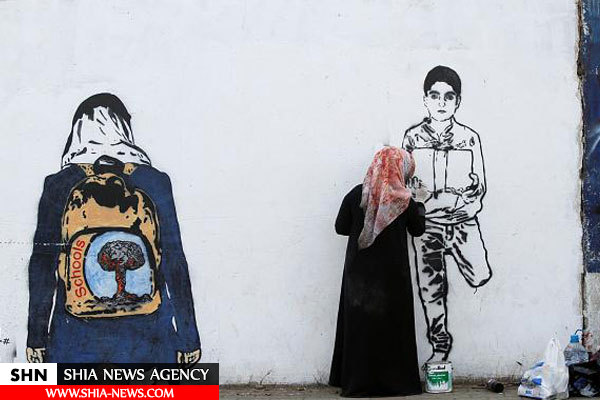 نقاشی های دیواری زن یمنی در صنعا به یاد قربانیان جنگ