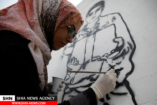 نقاشی های دیواری زن یمنی در صنعا به یاد قربانیان جنگ