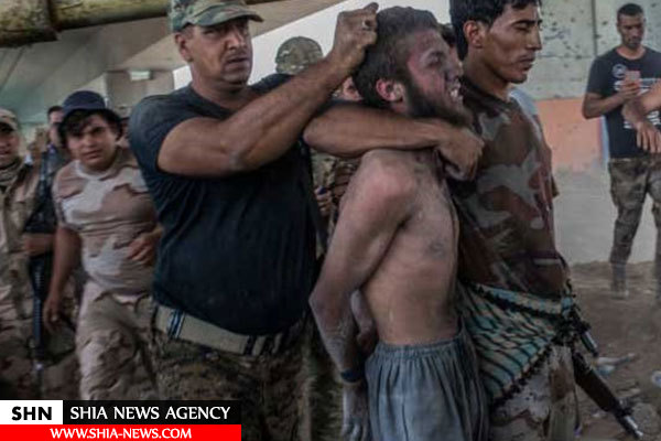 تصاویر دستگیری خفت بار تروریست‌های داعش