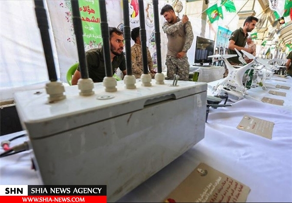 نمایشگاه غنایم داعش در بین‌الحرمین برپا شد+ تصاویر