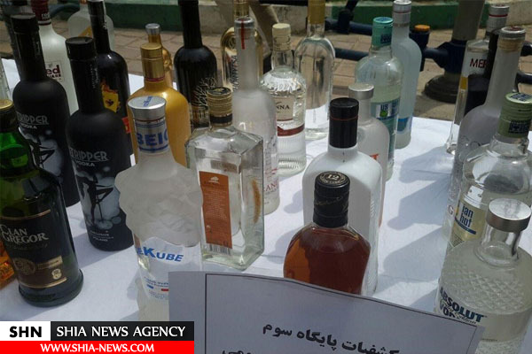 کشف ۷۰۰ بطری مشروبات الکلی در شمال تهران + تصاویر