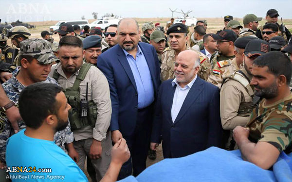 الحشد الشعبي يحرر منطقة جزيرة غرب سامراء والعبادي يتفقد القوات العراقية+ صور