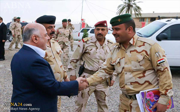 الحشد الشعبي يحرر منطقة جزيرة غرب سامراء والعبادي يتفقد القوات العراقية+ صور