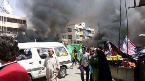 95 شهيدا وجريحا بتفجير مدينة الصدر الارهابي +صور