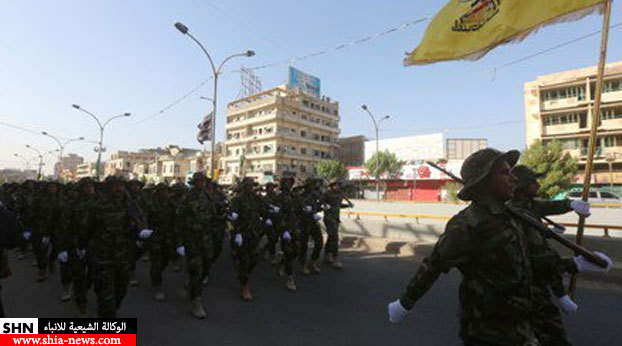 بالصور/ استعراض عسكري وسط بغداد