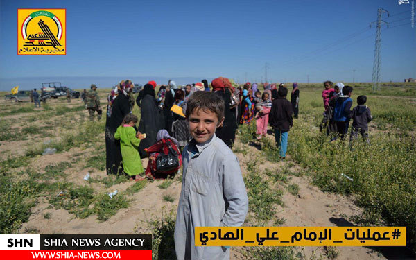 امداد رسانی حشدالشعبی به خانواده های عراقی+ تصاویر