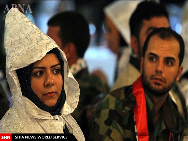ازدواج دسته جمعی نیروهای بسیج مردمی عراق/ تصاویر ازدواج دسته جمعی نیروهای بسیج مردمی عراق/ تصاویر