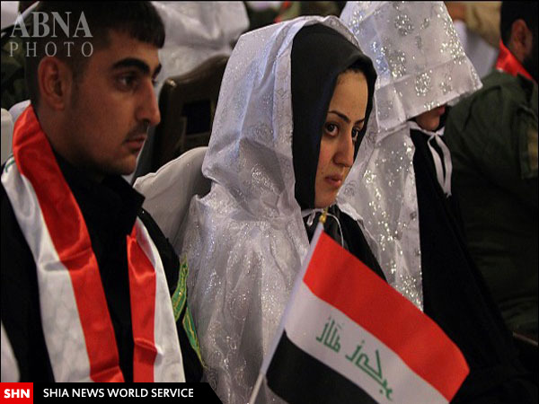 ازدواج دسته جمعی نیروهای بسیج مردمی عراق/ تصاویر ازدواج دسته جمعی نیروهای بسیج مردمی عراق/ تصاویر