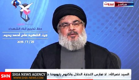 سید حسن نصرالله با آرم بنیادشهید بر صفحه تلویزیون سید حسن نصرالله با آرم بنیادشهید بر صفحه تلویزیون