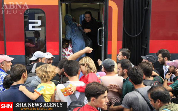 تصاویر آوارگان سوری سوار بر قطار سرگردان در اروپا