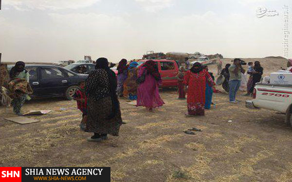 فرار دسته جمعی صدها عراقی از مناطق داعش +تصاویر