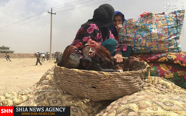 فرار دسته جمعی صدها عراقی از مناطق داعش +تصاویر