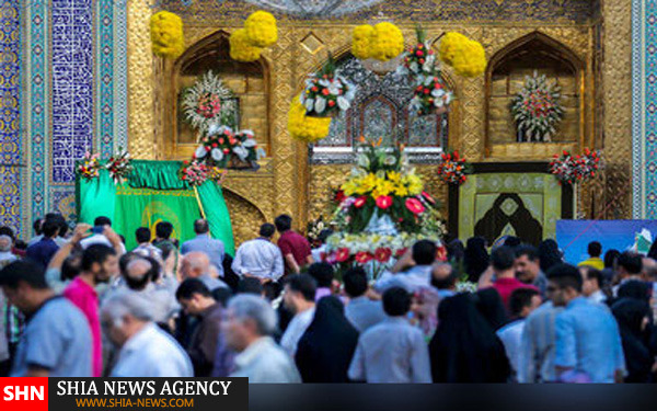 تعویض پرچم بارگاه مطهر امام رضا (ع) + تصاویر