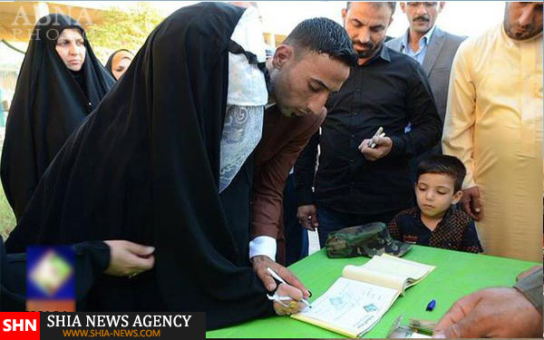 تقدیر زوج عراقی از رزمندگان حشد شعبی + تصاویر تقدیر زوج عراقی از رزمندگان حشد شعبی + تصاویر