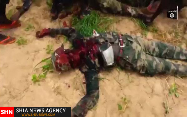ذبح سرباز نیجریه ای توسط داعش + تصاویر (+18)