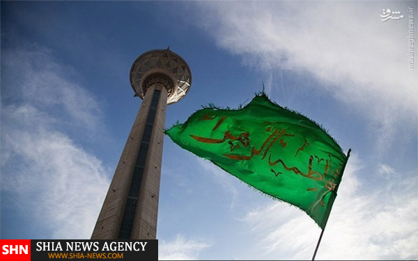 تصاویر اهتزاز پرچم حرم حضرت زینب(س) در برج میلاد