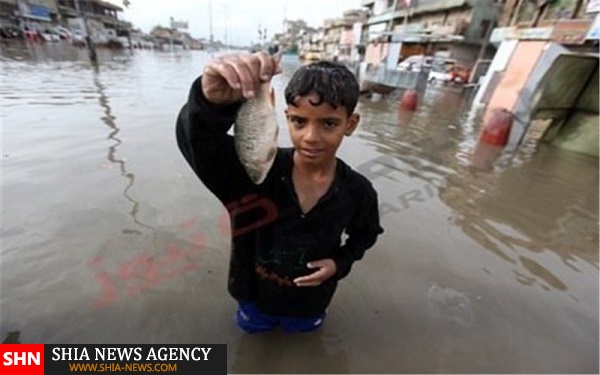 ماهیگیری مردم در خیابان‌های بغداد+ تصاویر