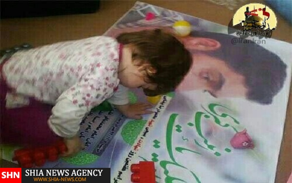 تصویری ازدختر سه ساله شهید مدافع حرم وعکس پدر