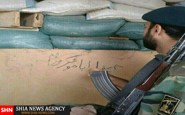 تصویر/ رزمنده ایرانی در زینبیه سوریه با شعار حیفاراباموشک میزنیم تصویر/ رزمنده ایرانی در زینبیه سوریه با شعار حیفاراباموشک میزنیم
