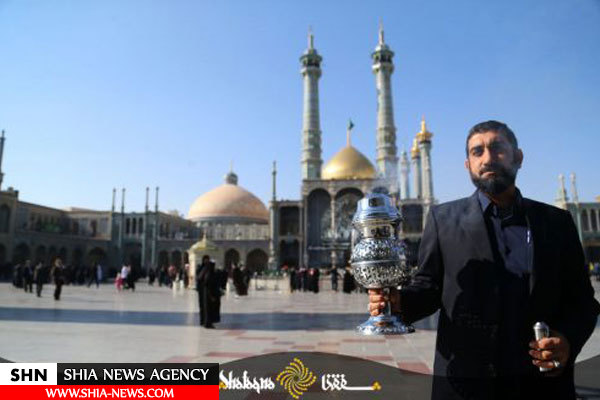 تصاویر تعویض پرچم حرم مطهر حضرت معصومه(س)