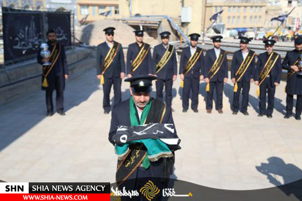 تصاویر تعویض پرچم حرم مطهر حضرت معصومه(س)