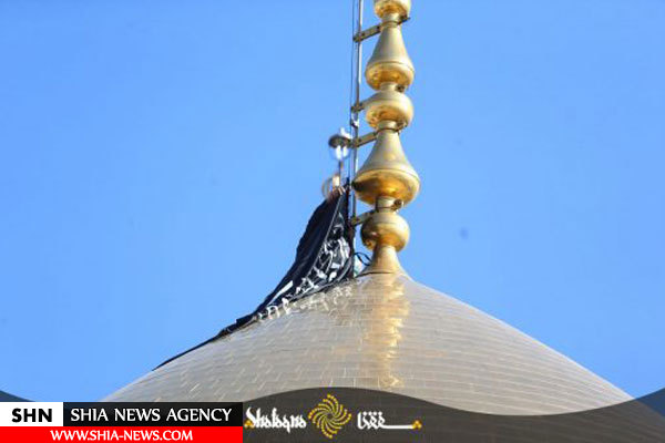 تصاویر تعویض پرچم حرم مطهر حضرت معصومه(س)