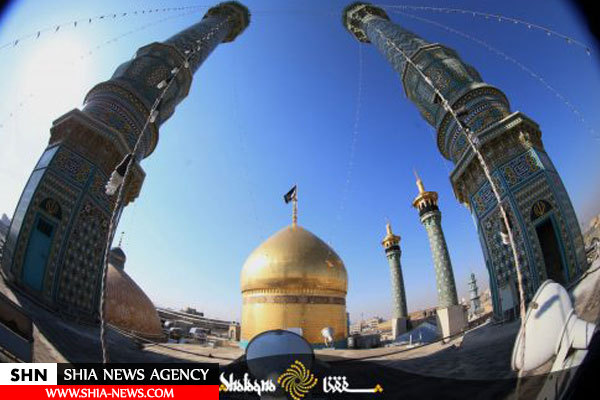 تصاویر تعویض پرچم حرم مطهر حضرت معصومه(س)