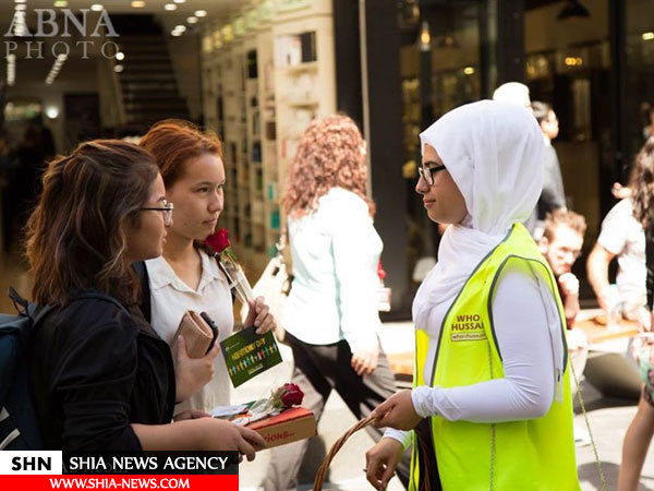 تصاویر هدیه شاخه گل شیعیان به غیرمسلمانان استرالیایی