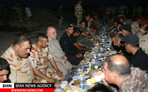 حیدرالعبادی در خط مقدم فلوجه افطار کرد+ تصاویر