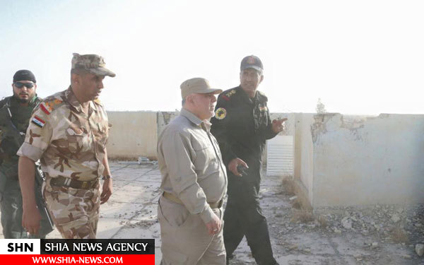 حیدرالعبادی در خط مقدم فلوجه افطار کرد+ تصاویر