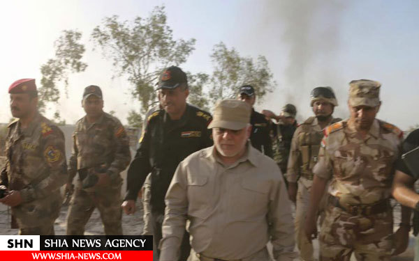 حیدرالعبادی در خط مقدم فلوجه افطار کرد+ تصاویر