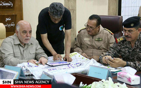 حیدرالعبادی در خط مقدم فلوجه افطار کرد+ تصاویر