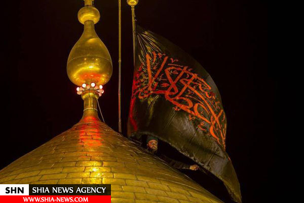 تصویر تعویض پرچم گنبد حرم حضرت ابوالفضل(ع) تصویر تعویض پرچم گنبد حرم حضرت ابوالفضل(ع)