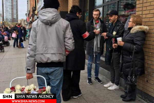 توزیع گل‌ به یاد شهدای کربلا در کانادا+ تصاویر