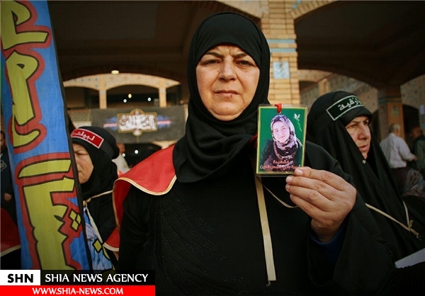 حضور خانواده شهدای نبل و الزهرا در پیاده‌روی اربعین+ تصاویر
