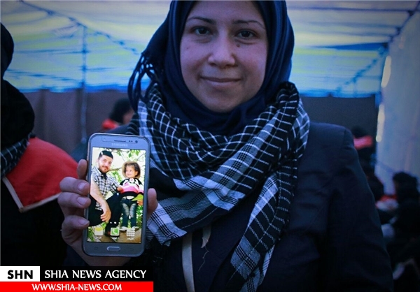 حضور خانواده شهدای نبل و الزهرا در پیاده‌روی اربعین+ تصاویر