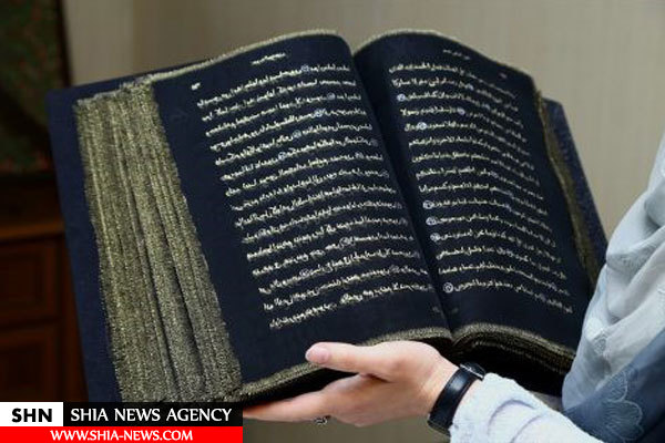 نگارش نخستین قرآن ابریشمیِ جهان+ تصاویر
