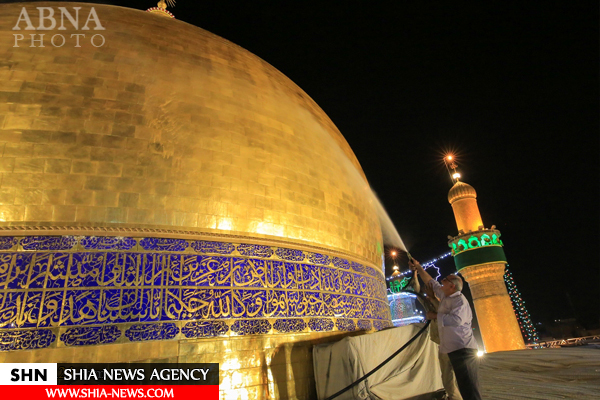 تصاویر شستشوی گنبد حرم مطهر امام علی(ع) تصاویر شستشوی گنبد حرم مطهر امام علی(ع)