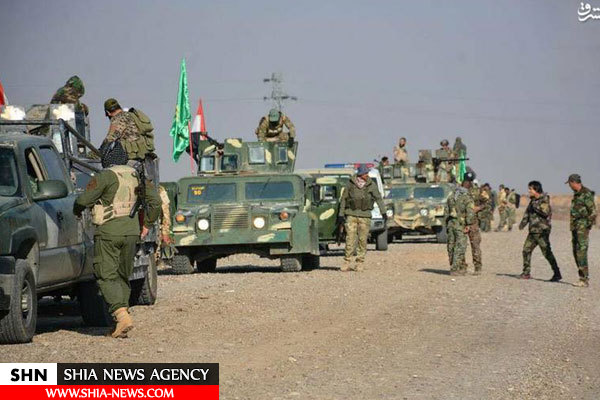 تصاویر عملیات نیروهای بسیج مردمی برای حذف پرچم سفیدها