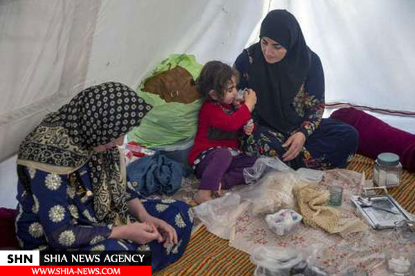 تصاویر زندگی روزمره مردم شهر زلزله زده ثلاث باباجانی