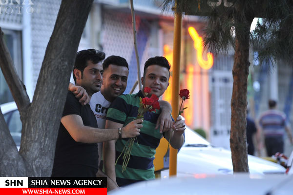 تصاویر توزیع گل بین مردم به مناسبت ولادت امام حسن مجتبی(ع) در شهر قم