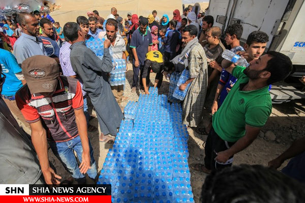 ارسال کمک های غذایی و پزشکی به آوارگان موصل+ تصاویر
