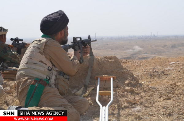 تصاویری از حضور فضلای حوزه علمیه عراق در عملیات آزادسازی منطقه الفتحة