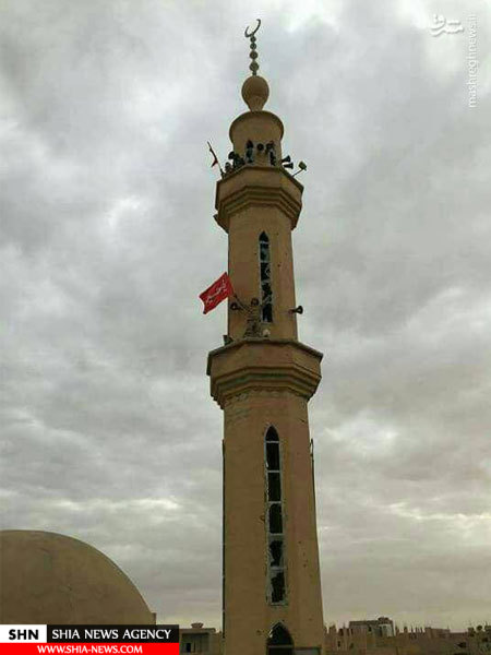 تصویر اهتزاز پرچم یا حسین‌(ع) درآخرین پایگاه داعش